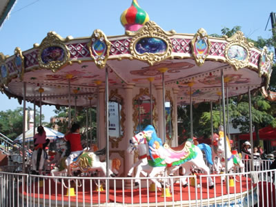 16 persons antique carousel horses